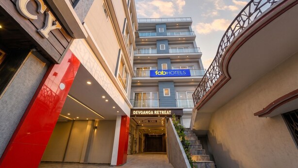 A hotel entrance with a sign for 'Devganga Retreat' and 'Fab Hotels'. - Fabhotel Dev Ganga Retreat (Rishikesh)