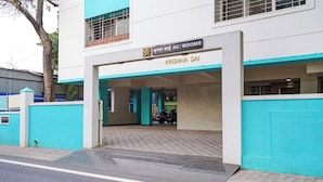 A building entrance with a sign reading 'Krishna Sai AC/Rooms.' - Fabhotel Krishna Sai (Pune)