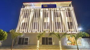 A multi-story building with a sign reading 'fab hotels.' - Fabhotel The Nine Prime (Jaipur)