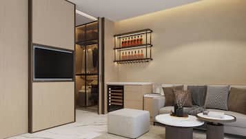 Suíte executiva, sacada, vista para o jardim | Área de estar