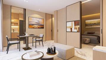 Deluxe Suite, Balcony, Garden View | Dining