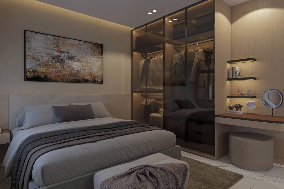 A modern bedroom with a bed, a large closet, a desk with a mirror, and a painting on the wall.