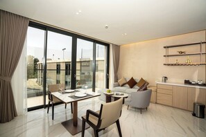 Deluxe Suite, Balcony, Garden View | Living area - The Five Hotel & Resort Evara (Hanoi)