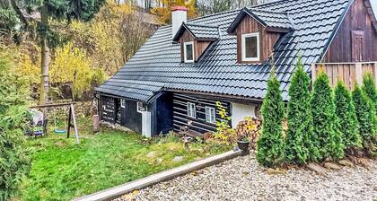 Roubenka u potoka by Interhome