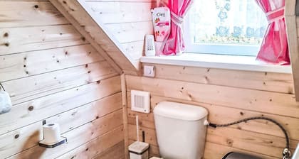 Roubenka u potoka by Interhome