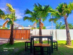Villa, 4 habitaciones, para fumadores, alberca privada | Restaurante al aire libre