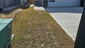 A residential street with houses, a garage, and a clear sky. - Room-private Master Bed & Bath #1 Cautle (Edmonton)