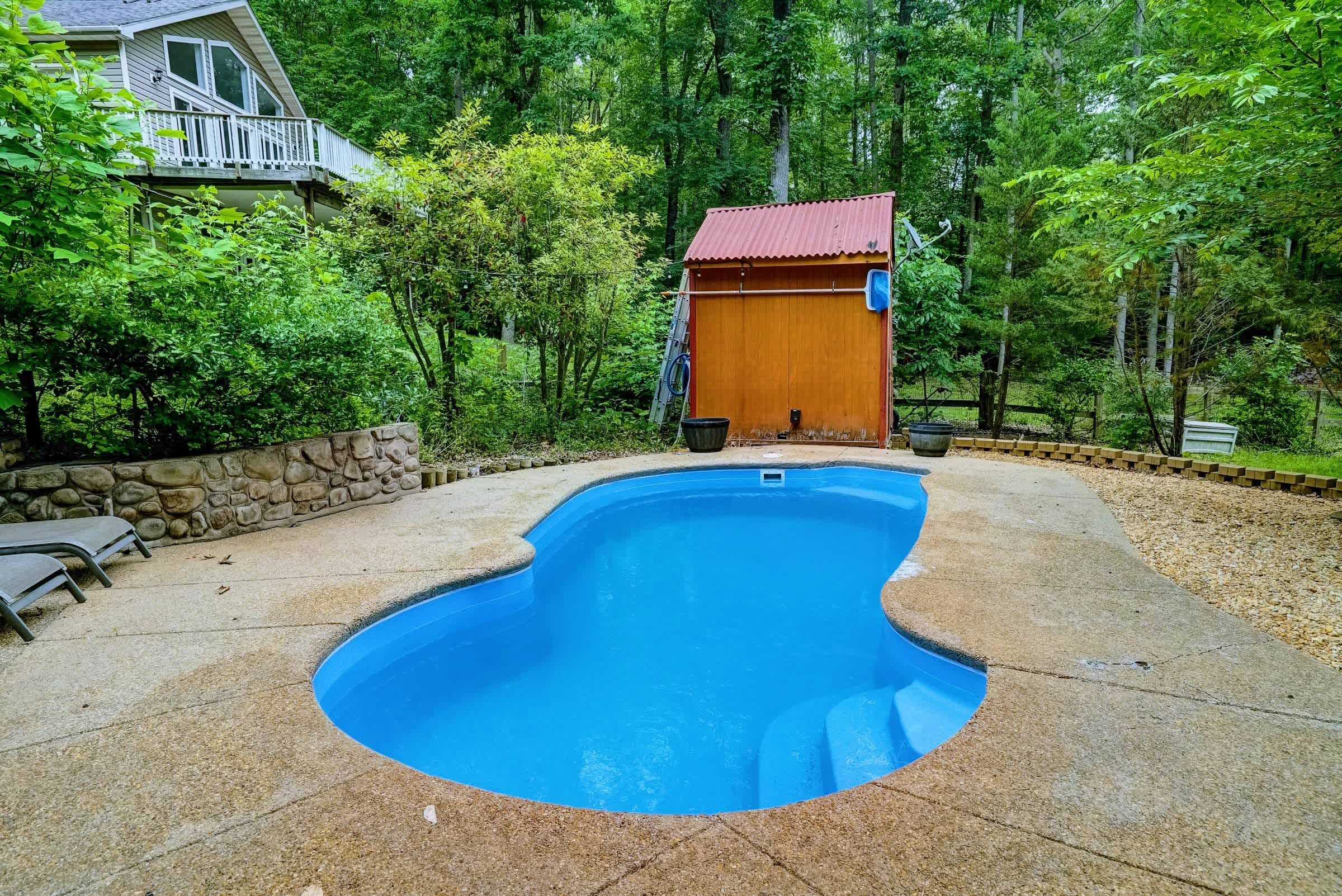 Lap It Up - The pool's clean lines and calm water are an open invitation to slow down and unwind.