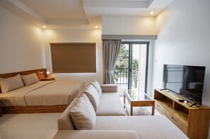 Apartamento, sacada, vista para a piscina | Área de estar