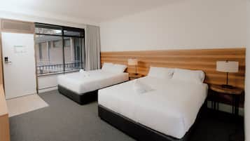 Standard Twin Room | Blackout drapes, iron/ironing board, free WiFi