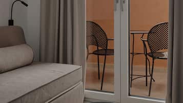 Superior Suite, Balcony | Living area