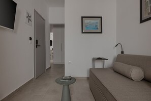 Familiesuite, balkong, delvis sjøutsikt | Oppholdsområde