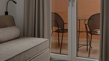 Family Suite, Balcony, Partial Sea View | Living area