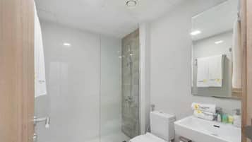 Luxury Apartment, Balcony, City View | Bathroom | Shower, rainfall showerhead, free toiletries, hair dryer