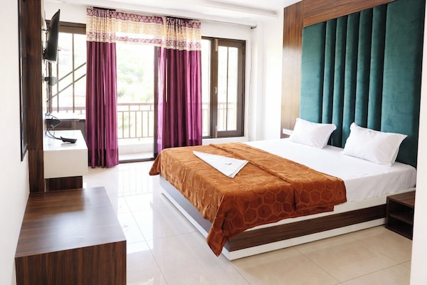 Quarto casal luxo, vista para a cidade