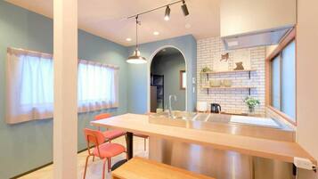 Apartment | Private kitchen | Fridge, microwave, stovetop, cookware/dishes/utensils