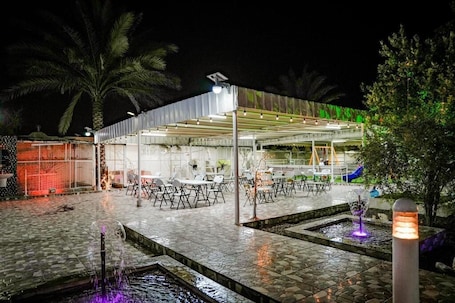 Outdoor dining. Green Resort Hotel