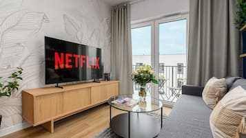 Superior Apartment, Balcony, Courtyard View | Living area | 40-inch flat-screen TV with cable channels