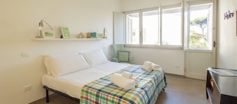 Cozy 60 sqm apartment, able to accommodate up to 4 people, located on the first floor of a building with no lift. The property is located in one of the quietest and greenest areas of Tirrenia, just 1 km from the beach. The center of Pisa is only 17 km aw