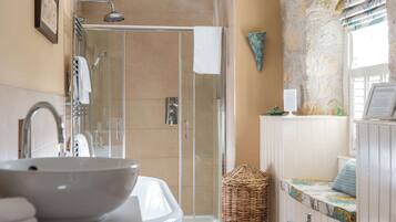 Shower, hair dryer, towels, shampoo