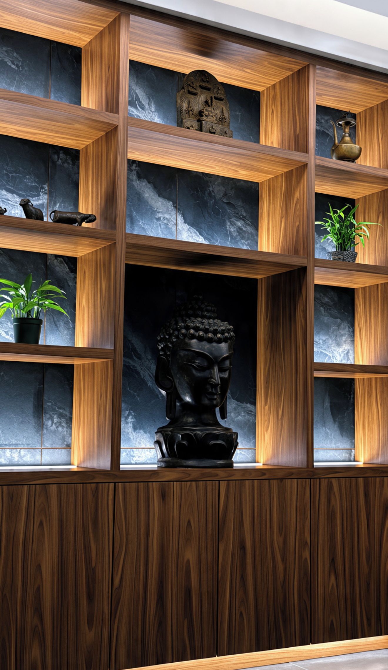 Una estantería de madera con una estatua de Buda en el centro, rodeada de varios objetos decorativos.