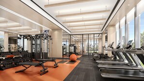 A modern gym with exercise equipment, large windows, and a city view. - Hyatt Place Jiaxing Nanhu (Jiaxing)