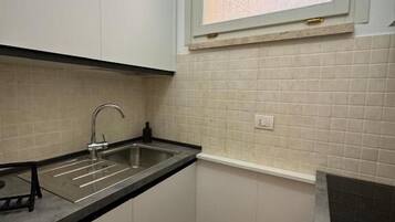 Fridge, oven, stovetop, espresso maker