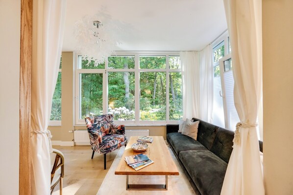 Living area - Waldblick vacation apartment with sauna between the forest and the sea (Heringsdorf)