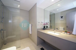 Shower, towels - Bloomfields 1BR Canal View in Water's Edge (Abu Dhabi)