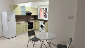 Apartamento, vista para a praia | Cozinha privada