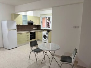 Appartamento, vista spiaggia | Cucina privata