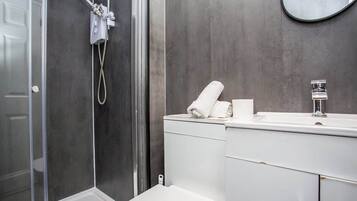 Shower, hair dryer, shampoo