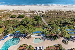 A resort with multiple swimming pools, a beach, and a boardwalk. - Salt & Sea Oceanfront Condo Balcony & Indoor Pool! (Myrtle Beach)