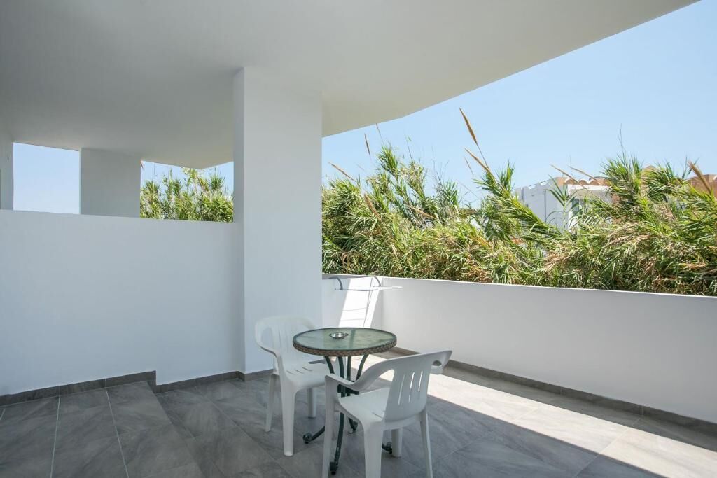 Junior Double Room, Balcony | Outdoor dining