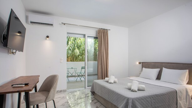 Habitació júnior | Caixa forta a l'habitació, wifi gratuïta i roba de llit 