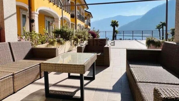 Unclassified image, 1 of 1, button - Elegant Lake View Apartment with Pool (Lavena Ponte Tresa)