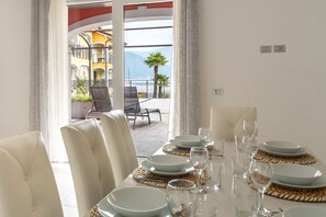 Dining - Elegant Lake View Apartment with Pool (Lavena Ponte Tresa)