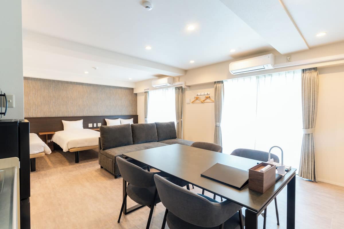 Family Triple Room, Balcony, City View | Free WiFi, bed sheets