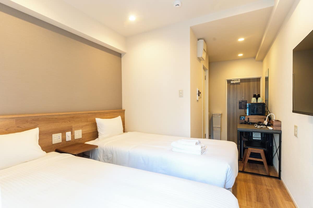 Twin Room, Non Smoking, Balcony | Free WiFi, bed sheets