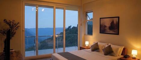 Luxury Suite, Balcony, Mountain View | Desk, laptop workspace, iron/ironing board, free WiFi