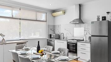 Coffee/tea maker, fridge, microwave, oven