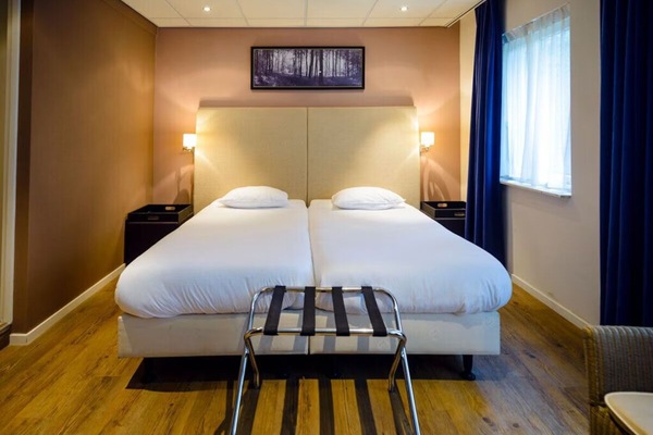 Drift off in a warm, calming room with plush pillows.