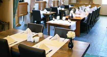 Comfortable Stay with Breakfast and Parking Near Brielle’s Old Town!