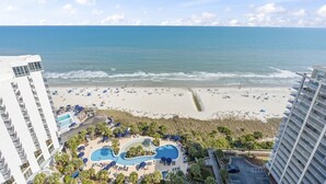 A resort with a pool, beach, and ocean view. - 2002p 2 Bedroom Condo (Myrtle Beach)