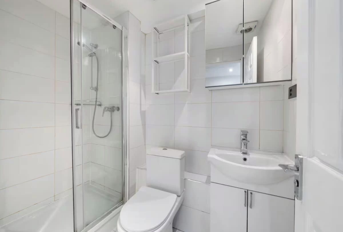 Shower, towels, soap, toilet paper