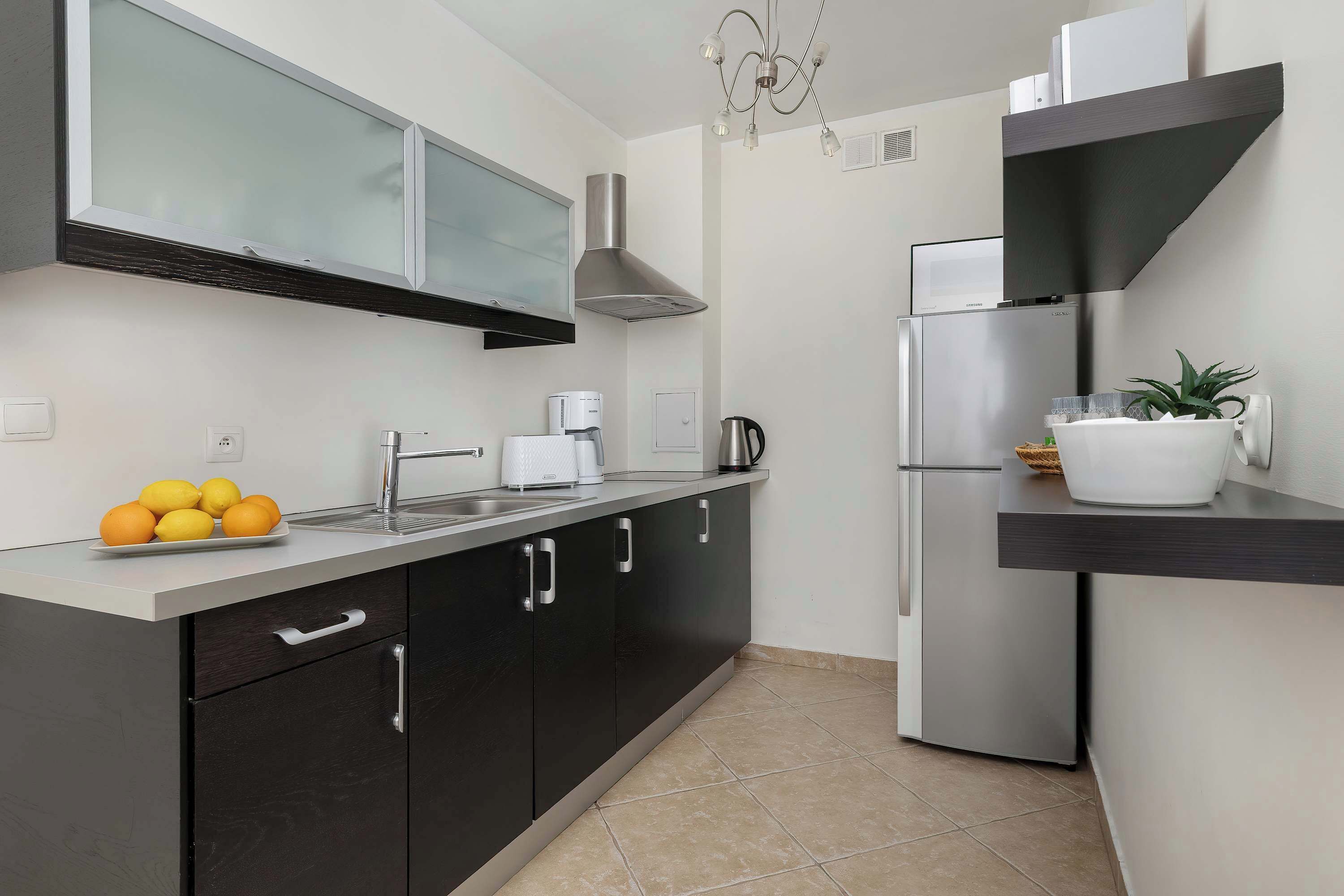 Fridge, microwave, stovetop, coffee/tea maker