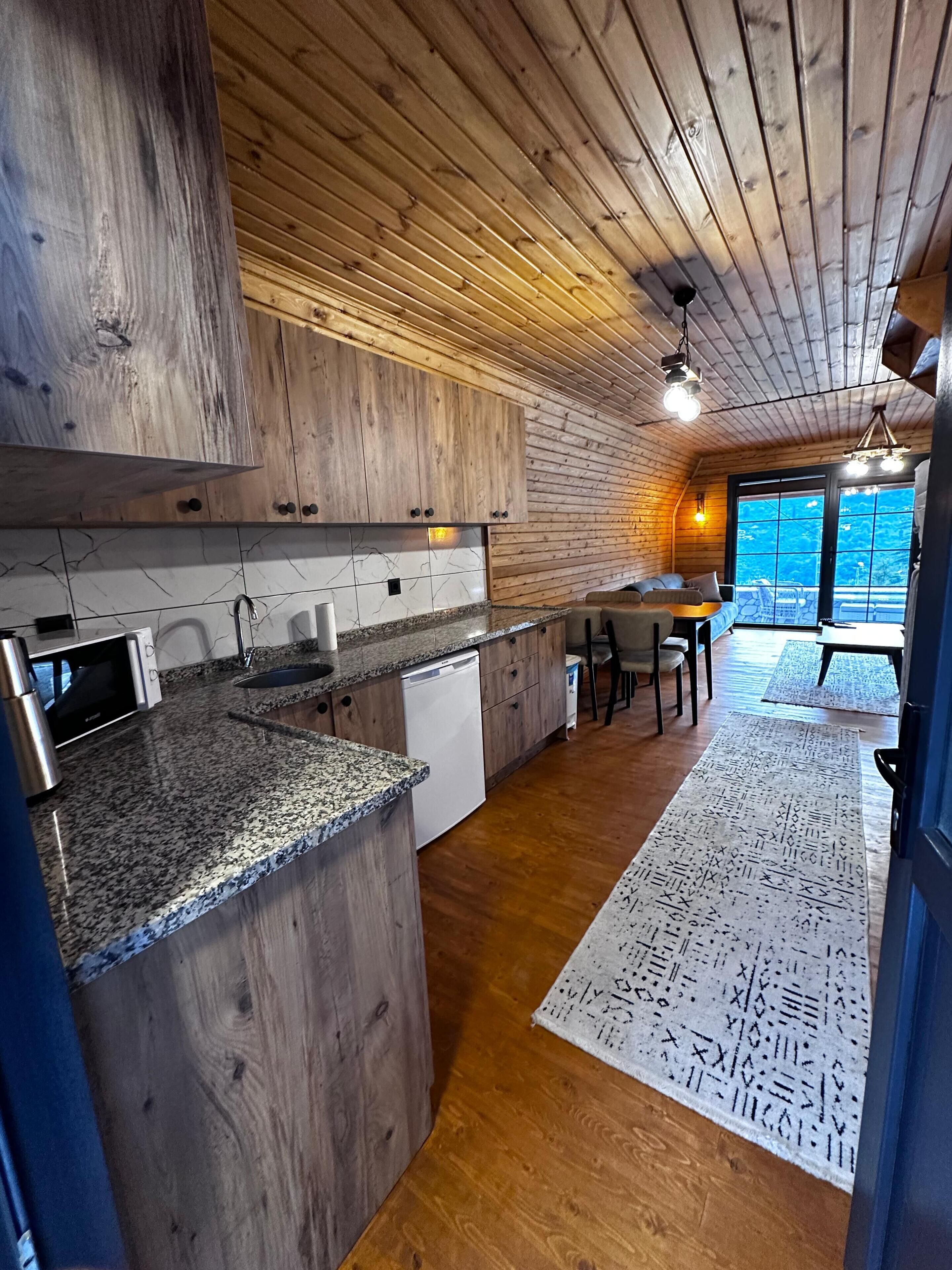 Bungalow Confort, four à micro-ondes, vue sur la montagne | Intérieur