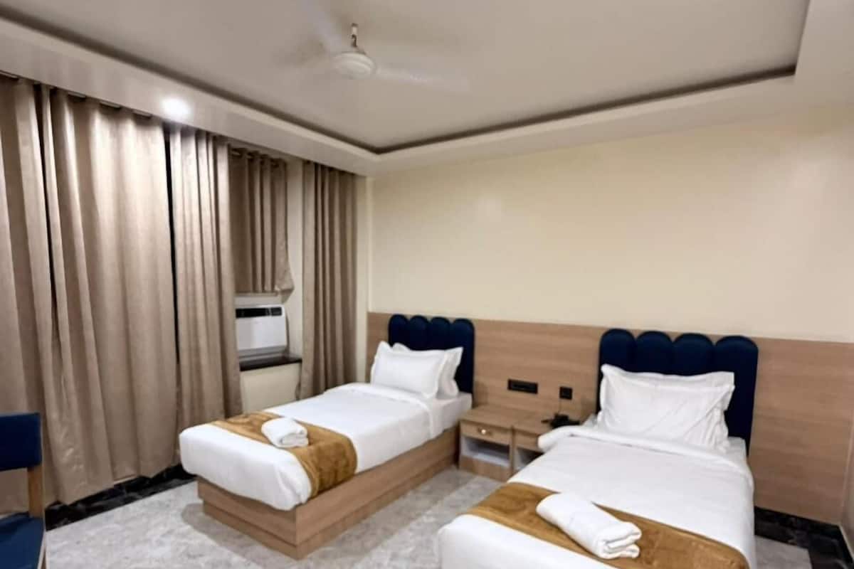 Chambre Supérieure avec lits jumeaux