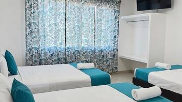 Classic Triple Room, City View | Hypo-allergenic bedding, down comforters, iron/ironing board, free WiFi