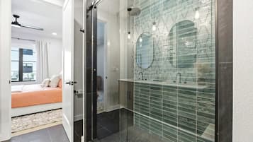 Shower, hair dryer, towels, shampoo
